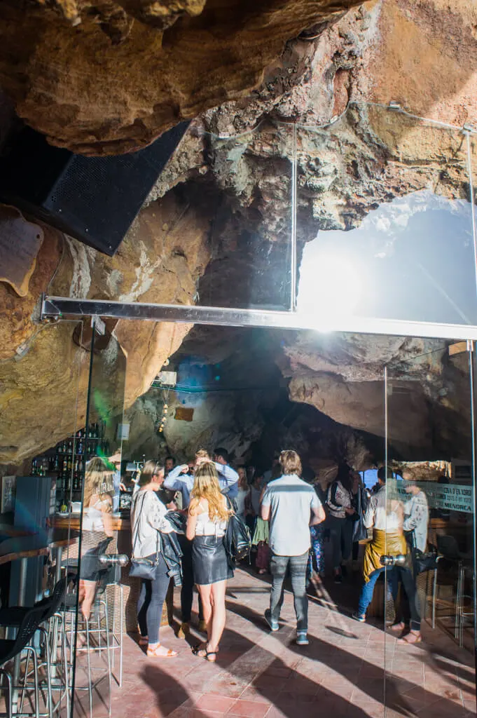 Drinks in a Cave at Cova D'En Xoroi in Menorca, Spain || The Travel Tester